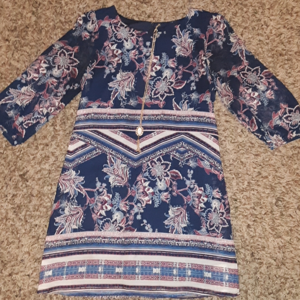 Fancy patterned dress with necklace